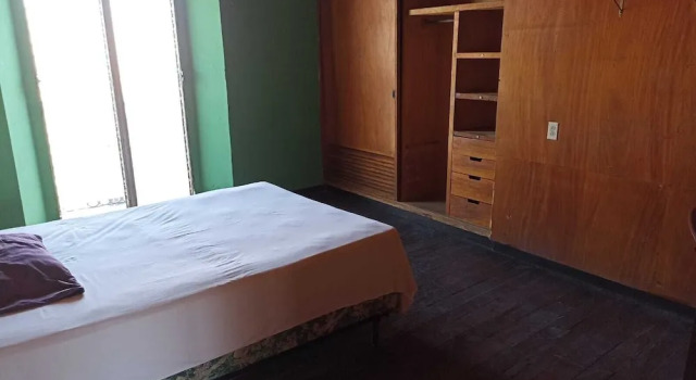 Кровать в общем номере Hostal y Hotel Villa Morena