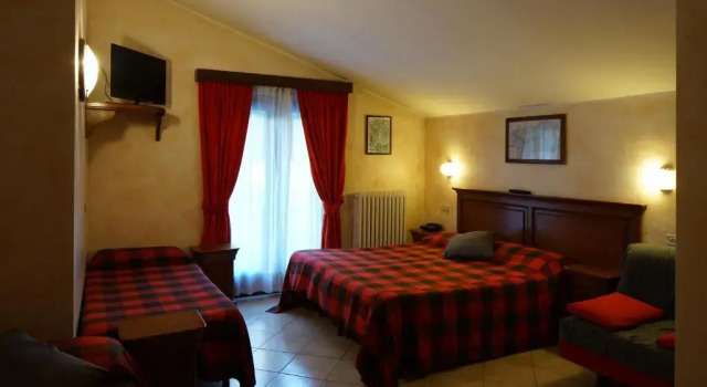 Четырёхместный номер Standard Hotel Al Caminetto