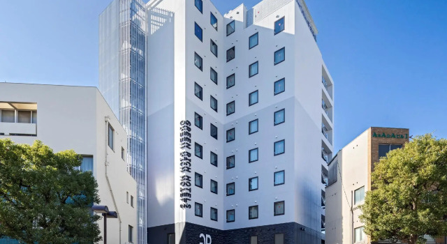 Кровать в общем номере Green Rich Hotel Kurashiki Ekimae