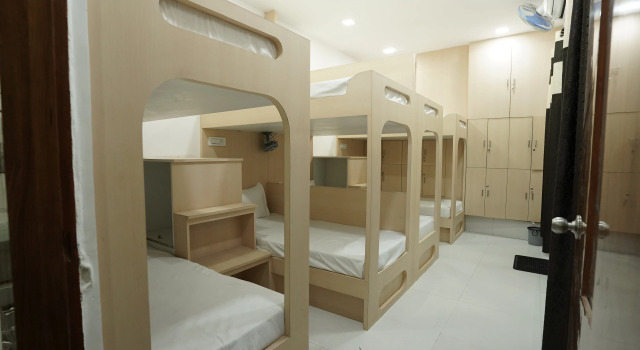 Кровать в общем номере Shri Govindam Hotels & Resorts