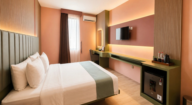 Номер Deluxe Grand Kangen Hotel Urip Sumoharjo