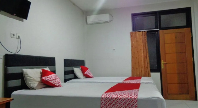 Oyo 2130 Magnolia Residence, Prenota Hotel Manado 