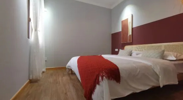 Люкс с 4 комнатами с видом на море Fangchengganggang Yuhaijing Homestay