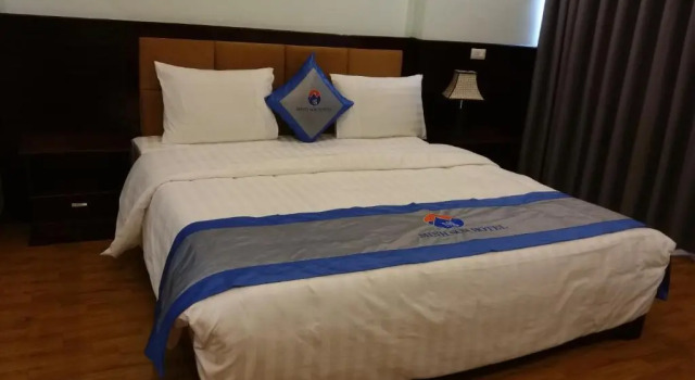 Одноместный номер Deluxe с балконом Minh Sơn HOTEL