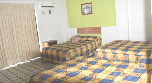 Трёхместный семейный номер Standard с балконом Hotel Arrecife Huatulco Plus