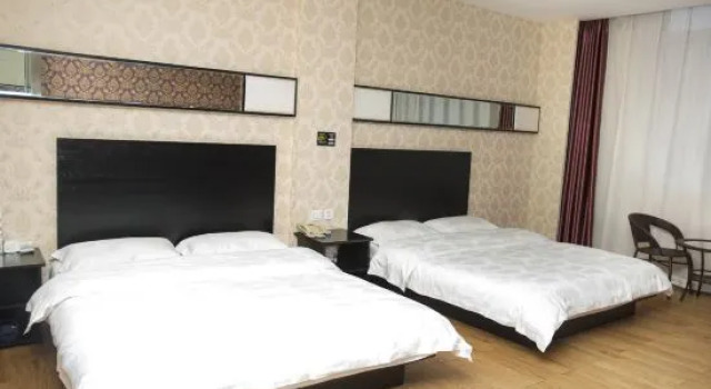 Люкс Deluxe Huadu Modern Business Hotel (Jiaohe Boutique)