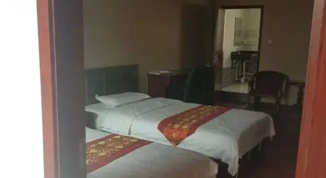 Yanchuan Qinglong Business Hotel, Prenota Hotel Yanan Shaanxi