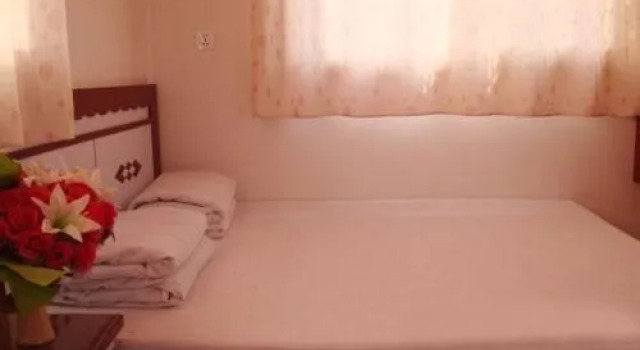 Xingsheng Yujia Apartment, Забронировать Апартаменты/квартира Пэнлай 
