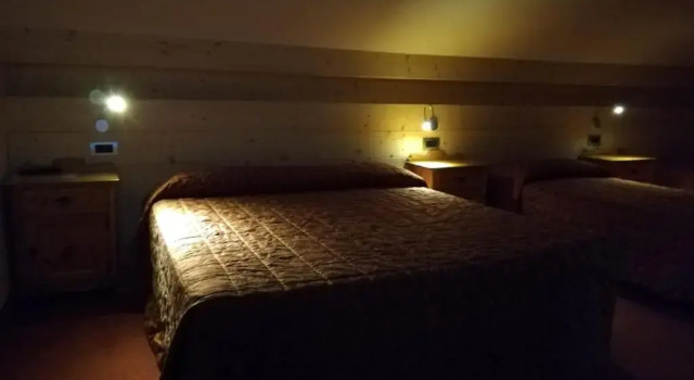 Четырёхместный номер Standard Мансарда с видом на горы Hotel Des Alpes