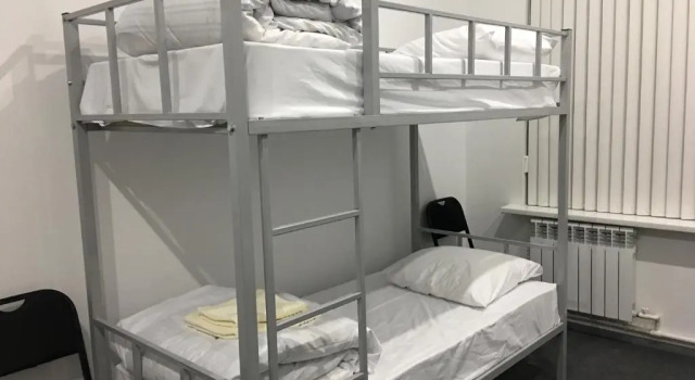 Кровать в общем номере Jules Verne Hostel