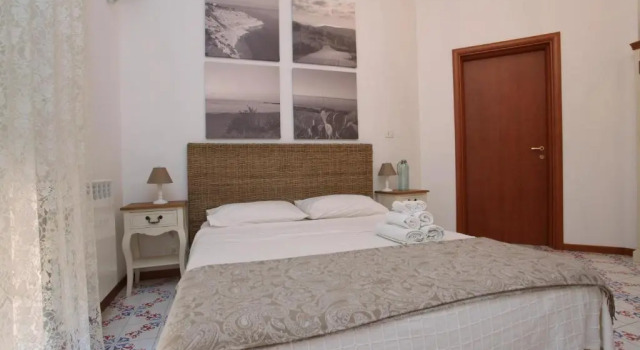 Четырёхместный номер Standard с балконом B&B Villa Maiolica