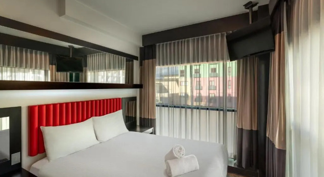 Номер Deluxe Essence Hotel Carlton