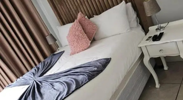 Tlmz Guesthouse, Reservar Hotel Newcastle KwaZulu-Natal