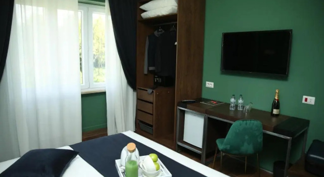 Номер Deluxe Unicum Roma Suites
