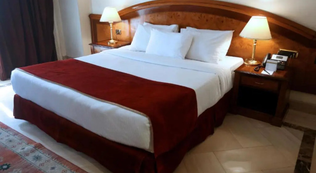 Двухместный люкс Deluxe Triumph Plaza Hotel