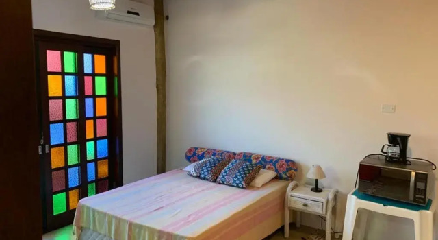 Apartamento com cachoeira no quintal
