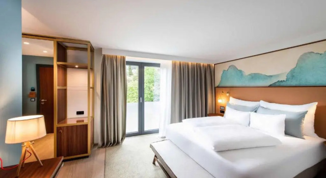 Двухместный номер Deluxe с балконом и с видом на озеро SEEGLÜCK Hotel Forelle Superior