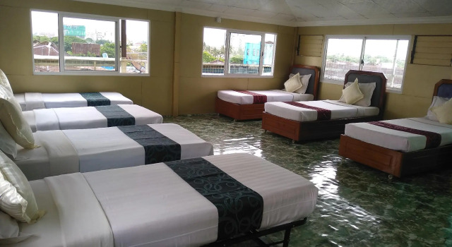 Кровать в общем номере Beautyland Hotel II