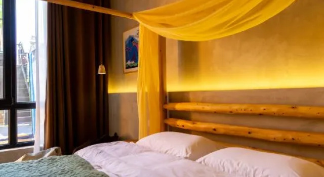 Кровать в общем номере Jiduqiu Homestay (Yanqing Yongning Ancient Town)