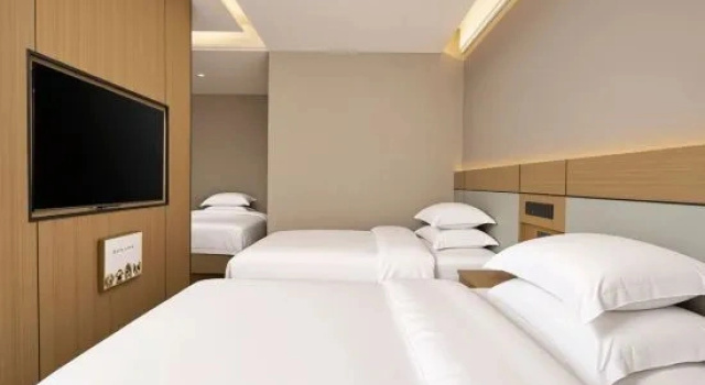 Трёхместный люкс MI LE XI HAI JU Hotel