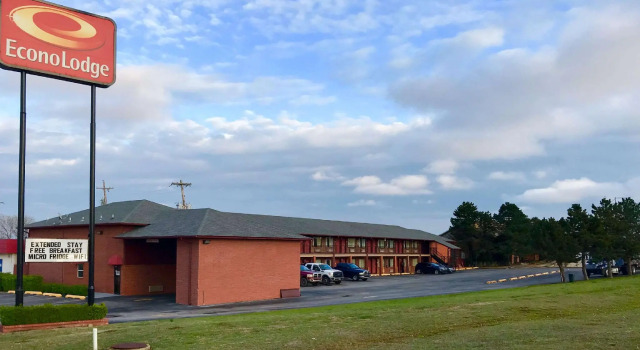 Кровать в общем номере Econo Lodge Purcell