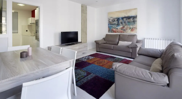 Gros Beach Apartment by FeelFree Rentals
