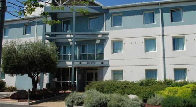 Кровать в общем номере B&B HOTEL Béziers