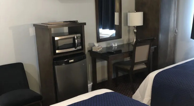 Четырёхместный номер Deluxe Travellers Motel - New Wing