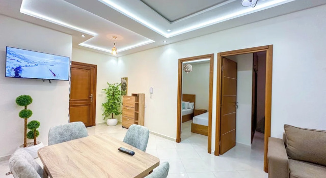 Апартаменты Comfort Elite Holiday Homes - Luxury & Centric Flat