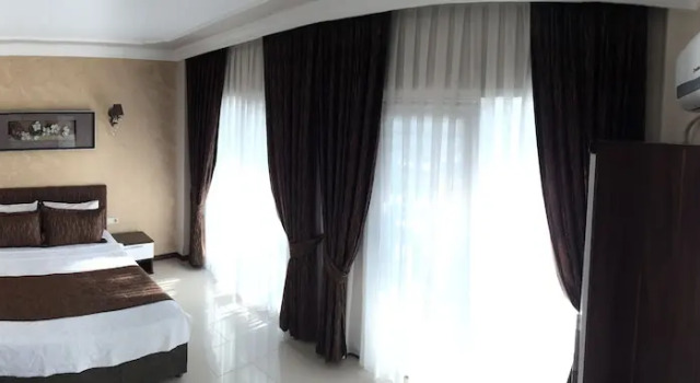 Трёхместный номер Deluxe с балконом Geyi̇kli̇ Sunshi̇ne Hotel
