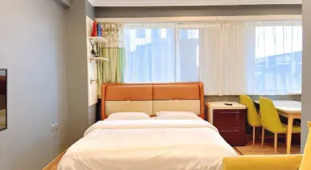 Семейный люкс Mudanjiang Yikai Apartment