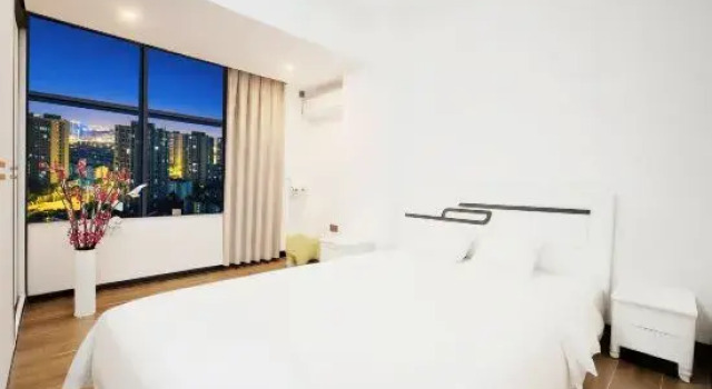 Люкс с 3 комнатами Xuwen Juxian Apartment (Chengdong Avenue Branch)