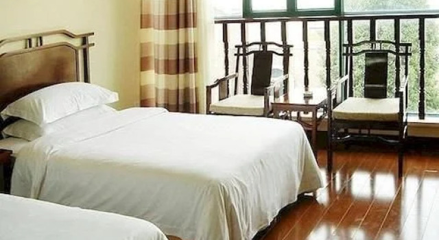 Suzhou Taihu Lake Elysee Garden Chamber Hotel(苏州香榭丽花园酒店), Book Hotel Hoteller i Suzhou med parkering, Parkering
