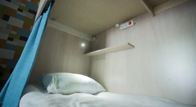 Łóżko w pokoju wieloosobowym Hostel Eleon