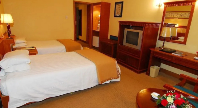 Adange Hotel, Забронировать Отель Отели Лицзян 4 звезды, рядом с Улица Сквер-стрит Древнего города Даянь, 4*