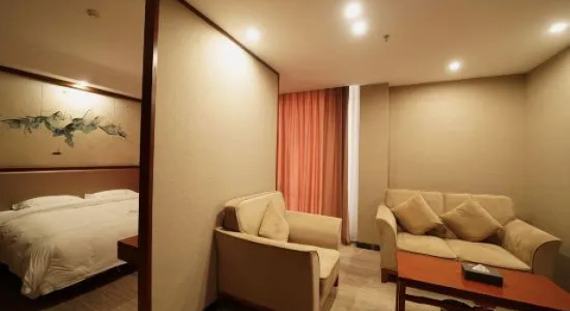 Двухместный люкс Dongpeng Hotel (Yichun Yizhou District Government Chengdong Branch)
