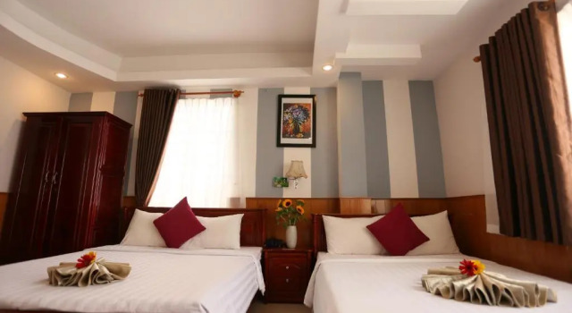 Четырёхместный номер Standard с балконом New Day Hotel
