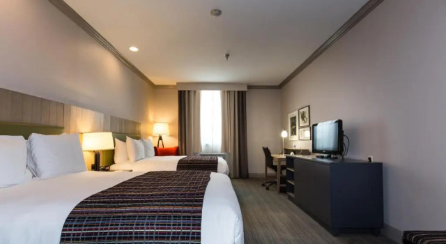 Четырёхместный номер Premium Country Inn & Suites by Radisson, Metairie New Orleans , LA