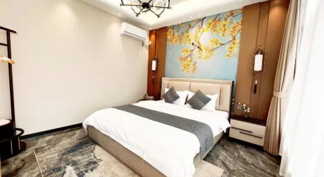 Семейный люкс Gujia Hotel