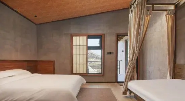 Кровать в общем номере с 2 комнатами с видом на внутренний двор Nordsee Manor by Arcadia Collection - Laoshan, Qingdao