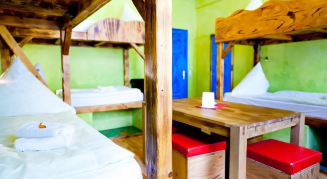 Кровать в общем номере Gästehaus Mezcalero