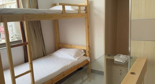 Кровать в общем номере (женский номер) Mingxing Hotel