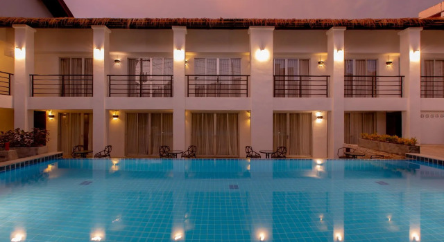 Кровать в общем номере The Nest Resort Patong