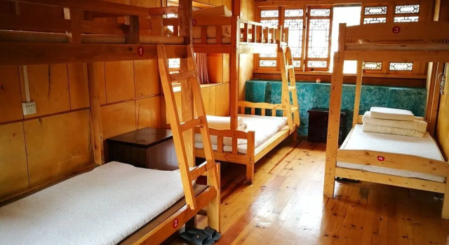 Sushe self-service Inn, Забронировать Отель Лицзян Юньнань, рядом с Улица Сквер-стрит Древнего города Даянь