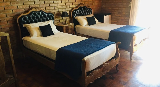 Четырёхместный номер Superior Hotel La Pedrera