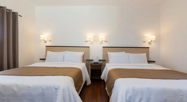 Четырёхместное шале с балконом Motel au Fleuve dArgent