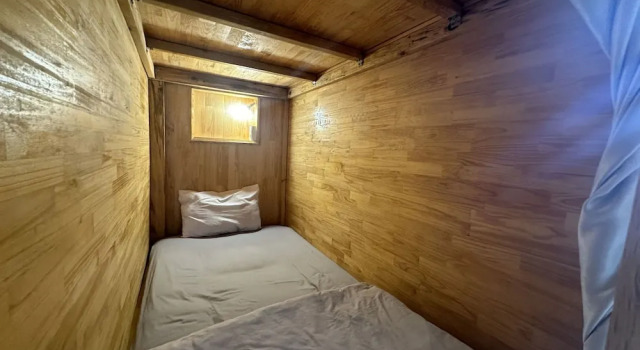 Кровать в общем номере SPOT ON 1229 Happy Dream Homestay