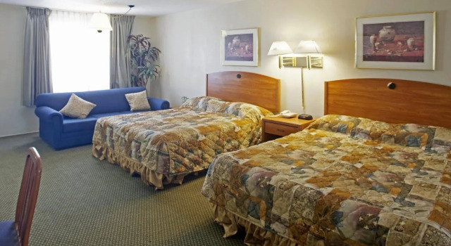 Big Chile Inn & Suites, Забронировать Отель Лас-Крусес Нью-Мексико