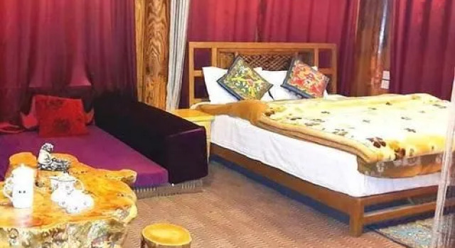 Lijiang Oriental Sun Hotel, Забронировать Отель Лицзян Юньнань, рядом с Улица Сквер-стрит Древнего города Даянь
