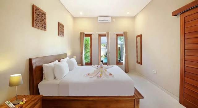 Вилла с балконом и с видом на бассейн Askara Villa Uluwatu